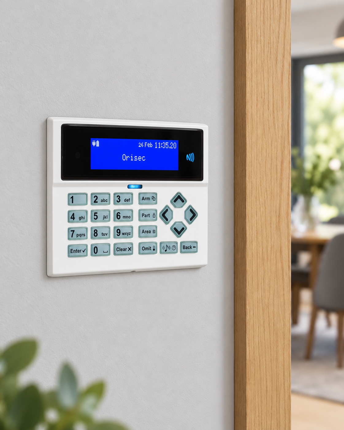 White Orisec MK-700 keypad flush-fitted beside an oak doorway